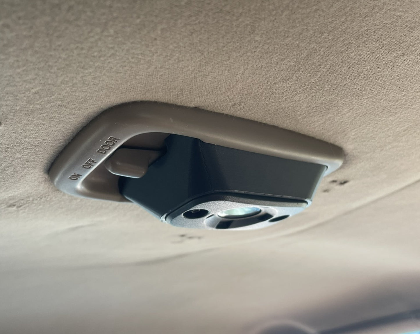 HF in black installed with factory tan trim